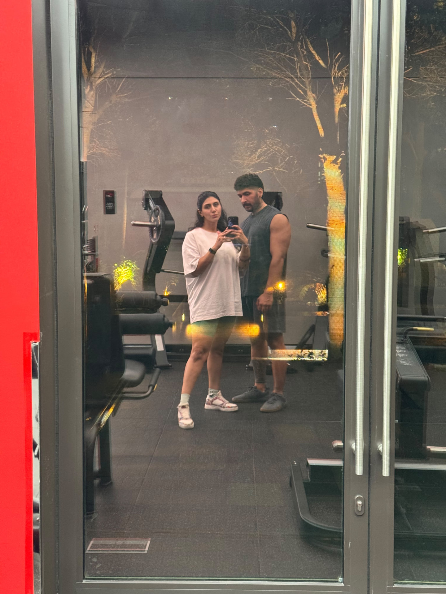 Sadaf and Arash in a gym at night