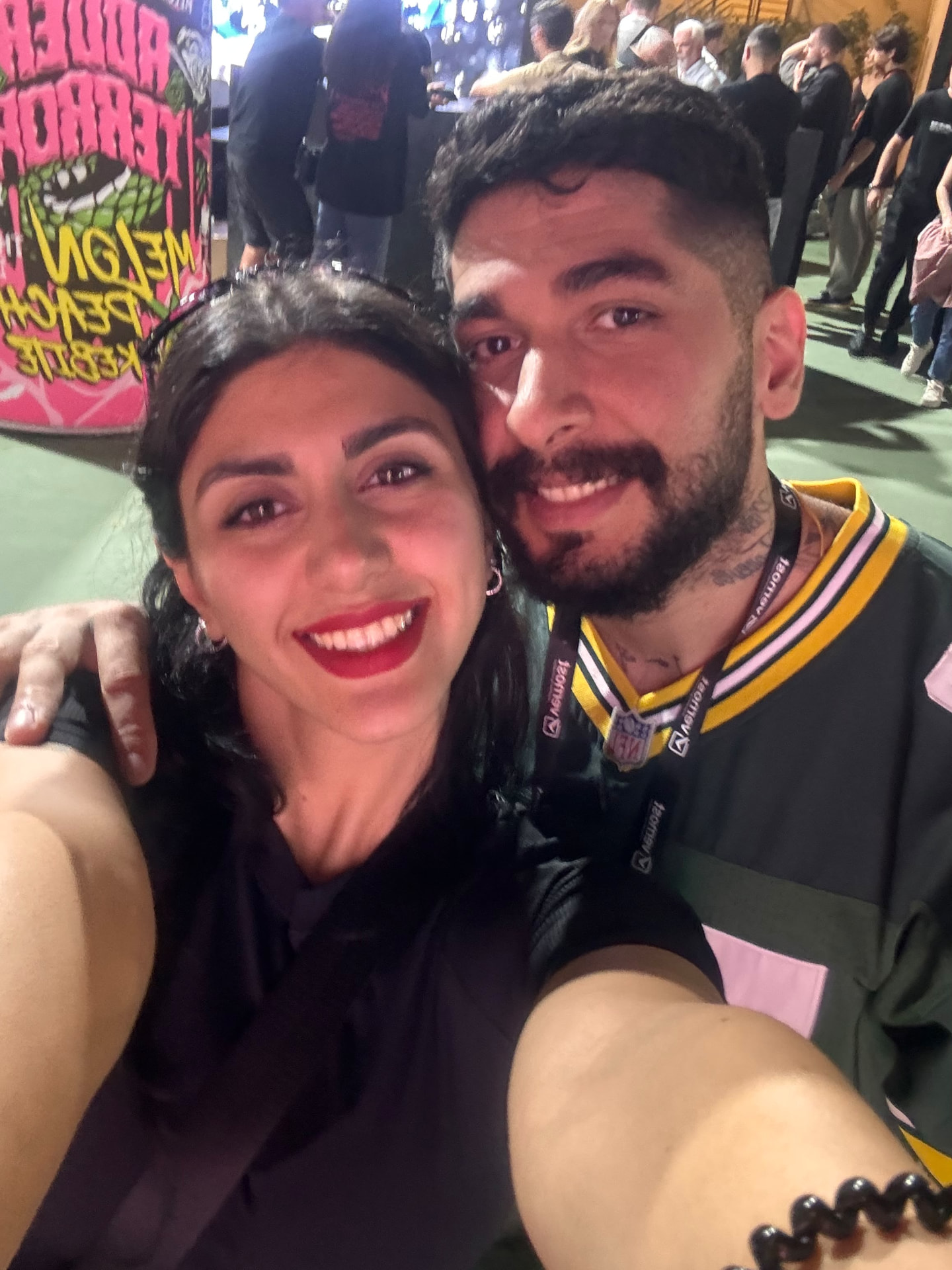 Sadaf and Arash selfie at an event
